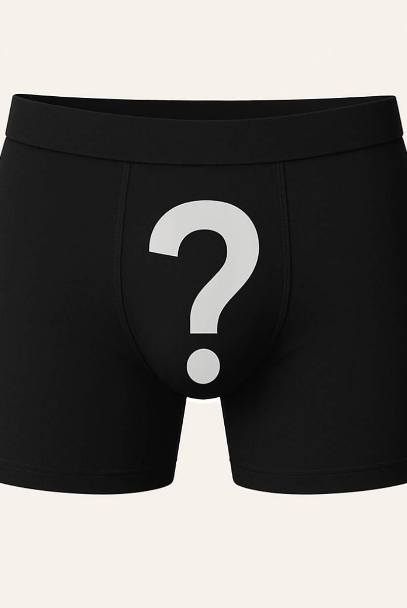 Black boxer briefs with a white question mark on a beige background