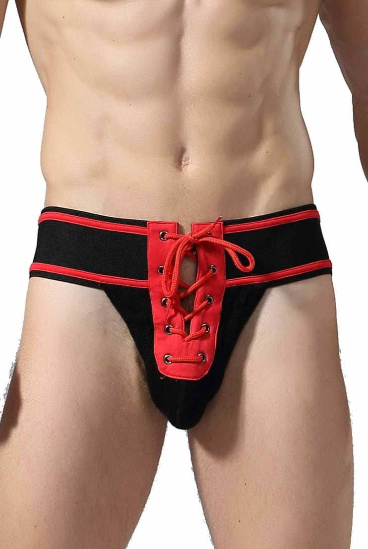 MOB Fetish Football Jockstrap in vibrant royal and red, crafted from premium polyester lycra, merging audacious design with luxury and ethical craftsmanship.