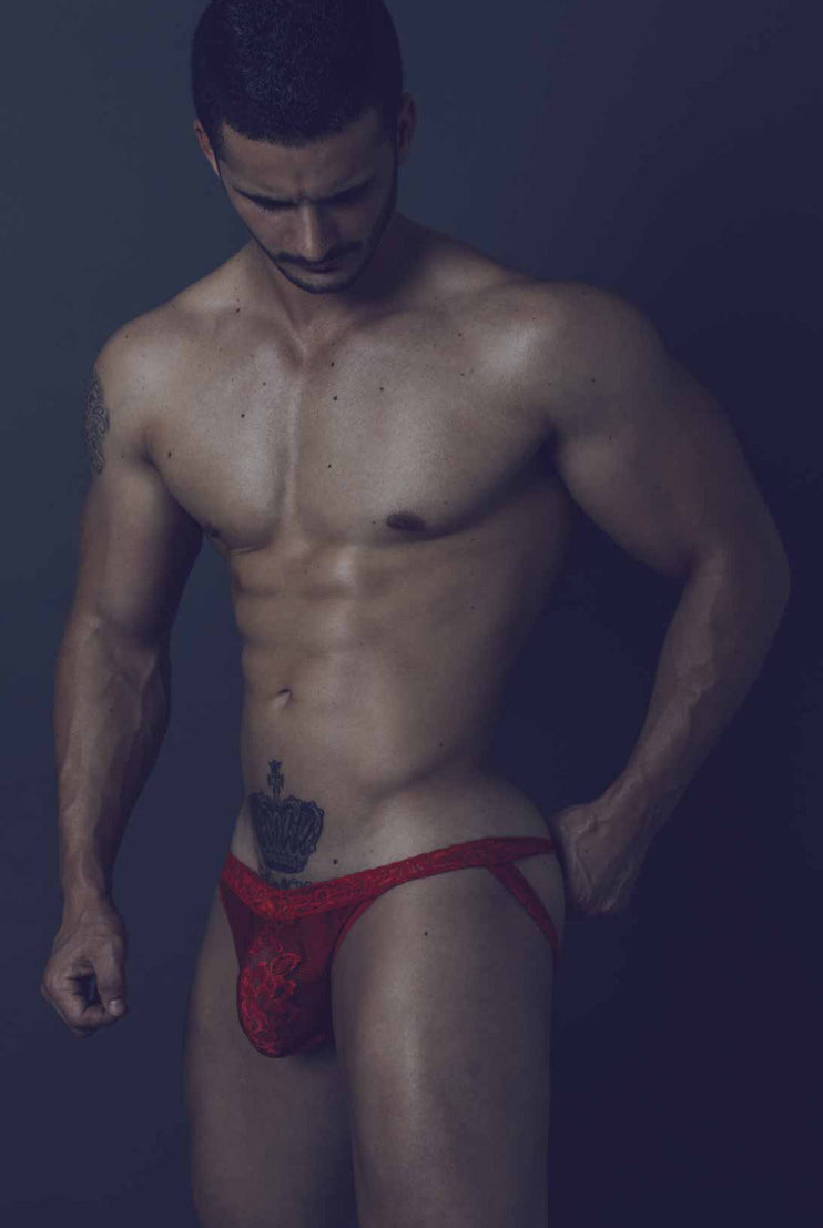 Sexy black lace jockstrap from MOB Erotic wear, designed for ultimate appeal and support. The front pouch showcases and supports, while the open back offers a bold look. Made of stretchy nylon-spandex blend for maximum comfort.