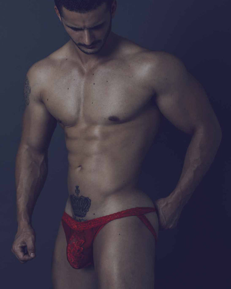 Sexy black lace jockstrap from MOB Erotic wear, designed for ultimate appeal and support. The front pouch showcases and supports, while the open back offers a bold look. Made of stretchy nylon-spandex blend for maximum comfort.